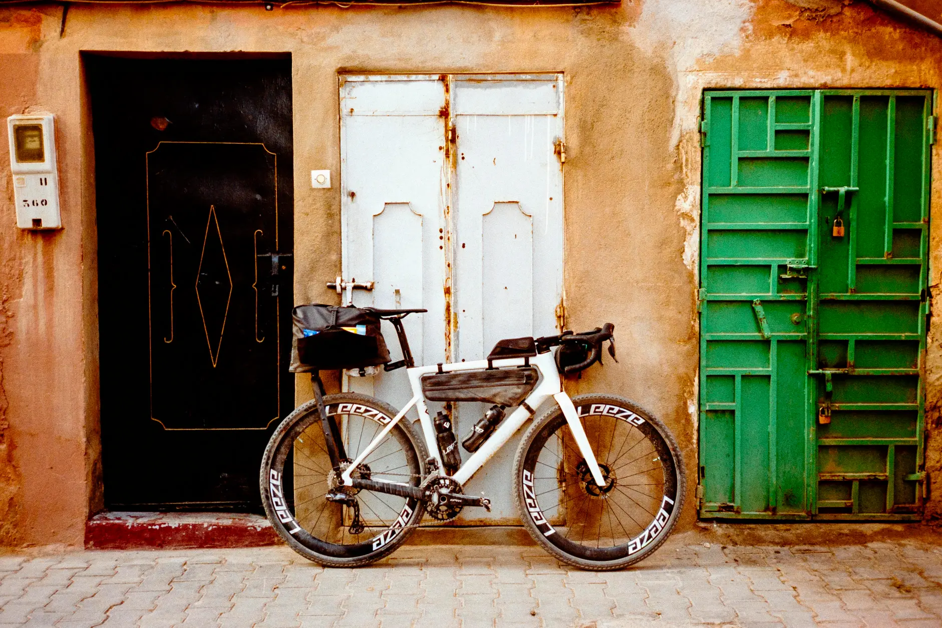 Rose Backroad FF with full bikepacking setup leaning against a wall
