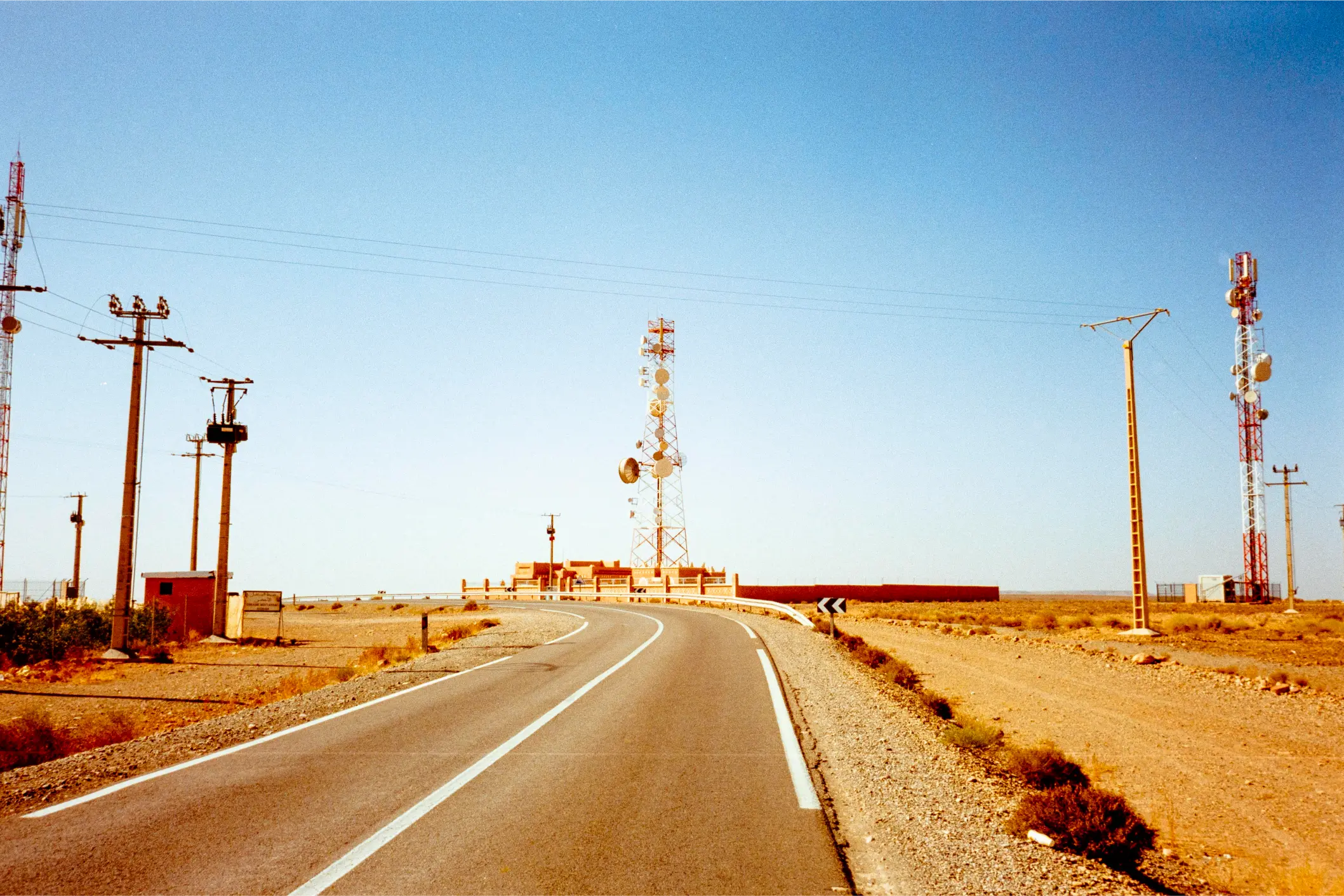 A lone telephone mast in the solitude of the Atlas Mountains
