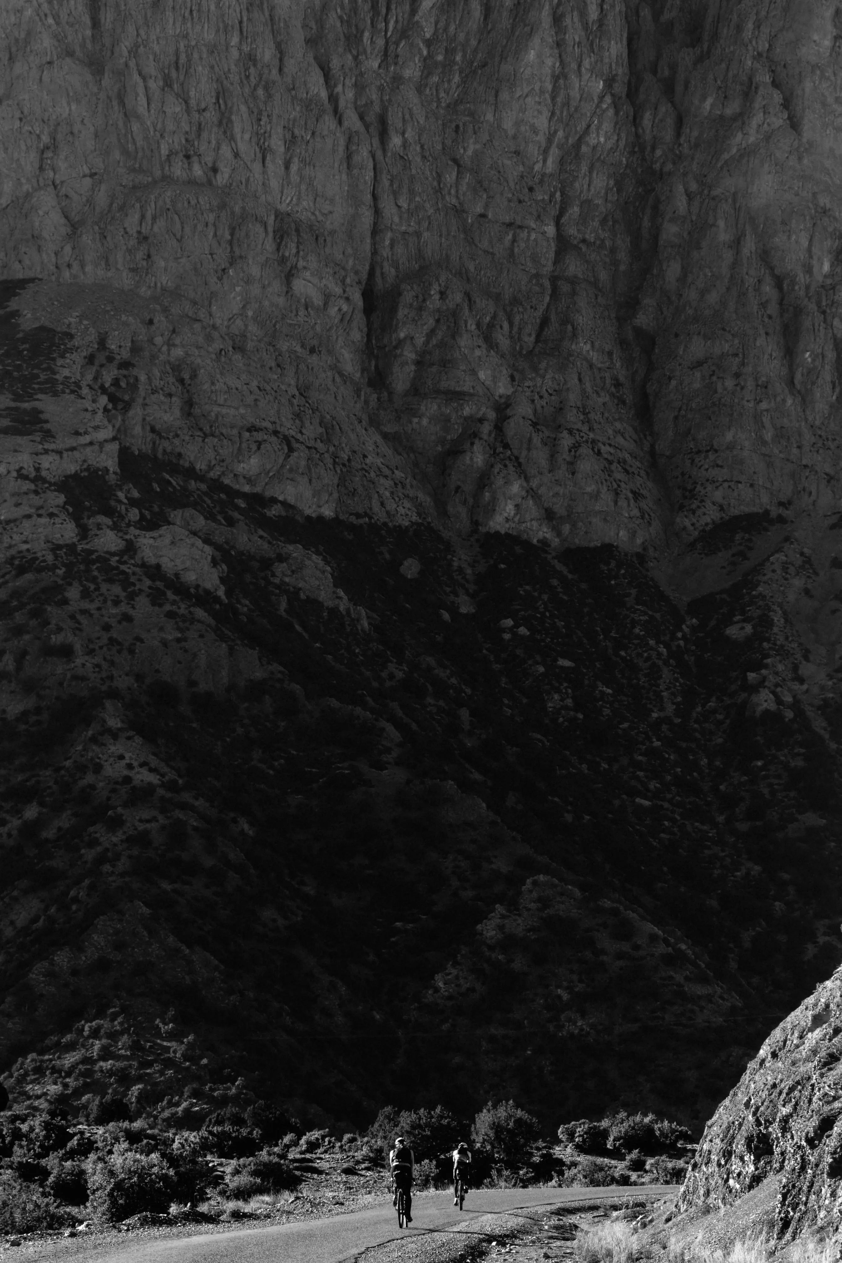 Katharina and Jan in front of a massive rock face in the Atlas Mountains