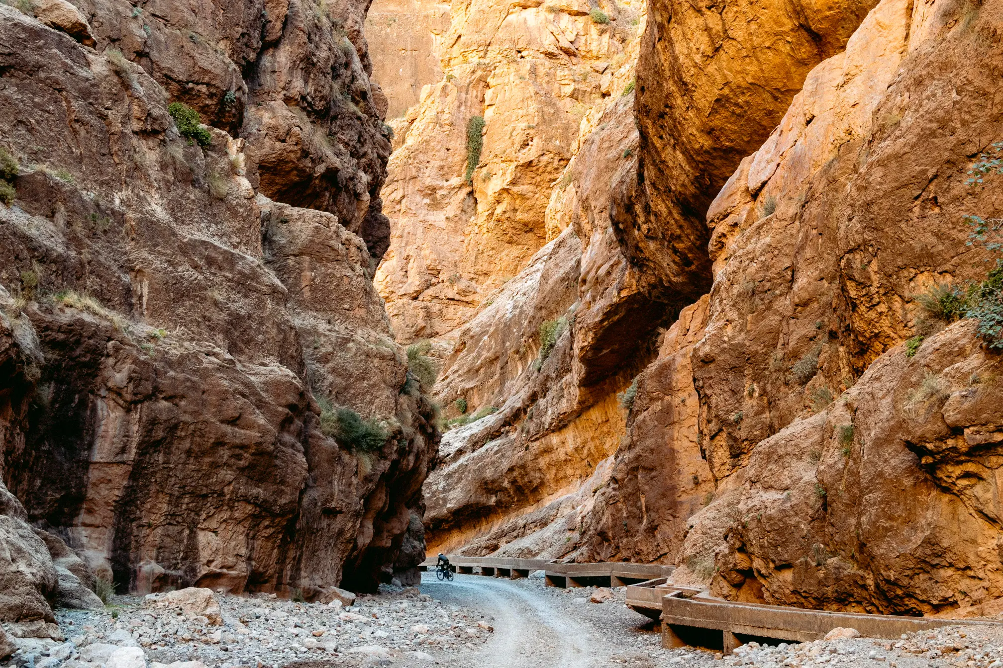 Massive rock gorge with aqueduct on the descent after the king stage