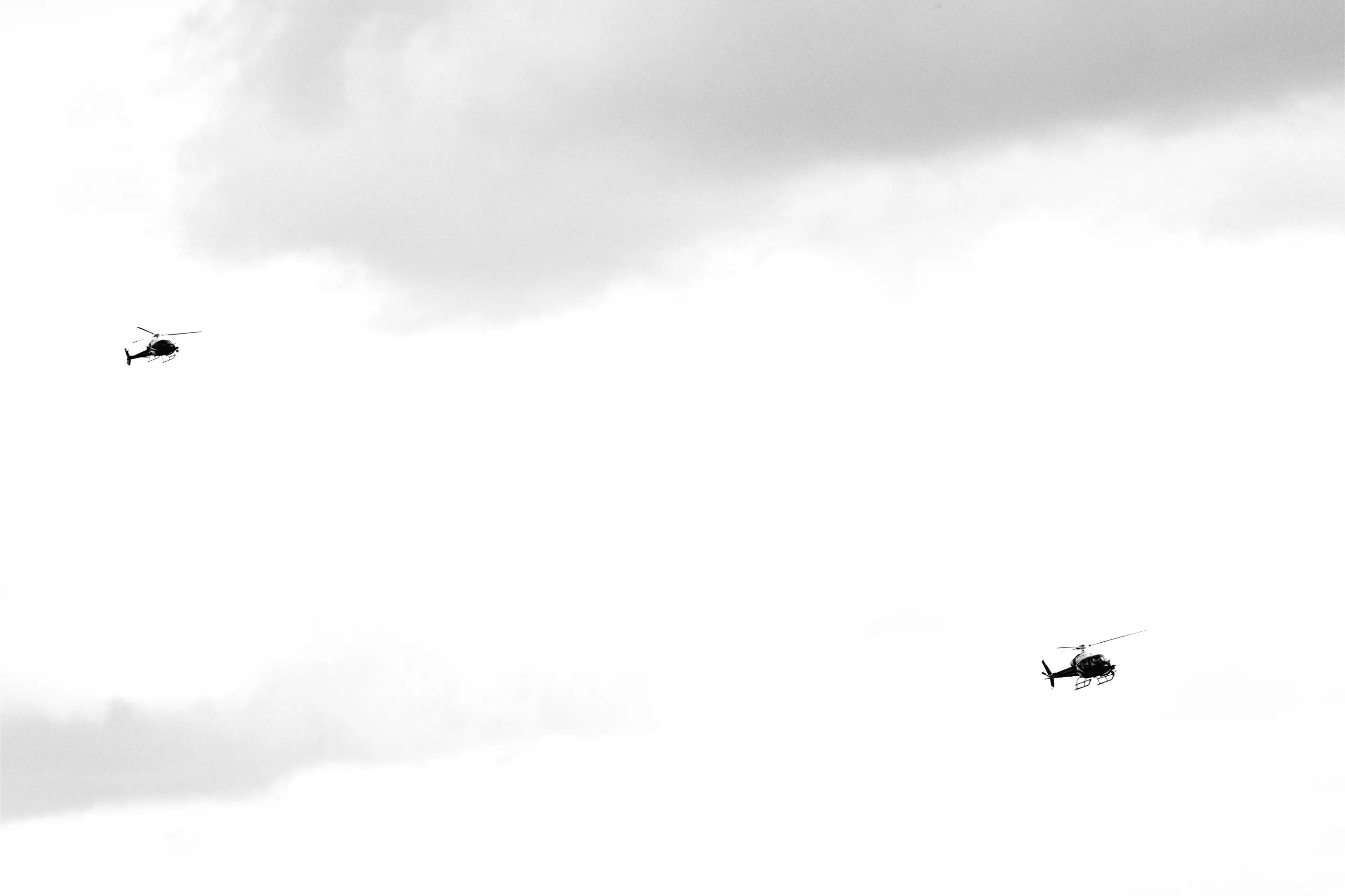 Two helicopters tracking the race from above